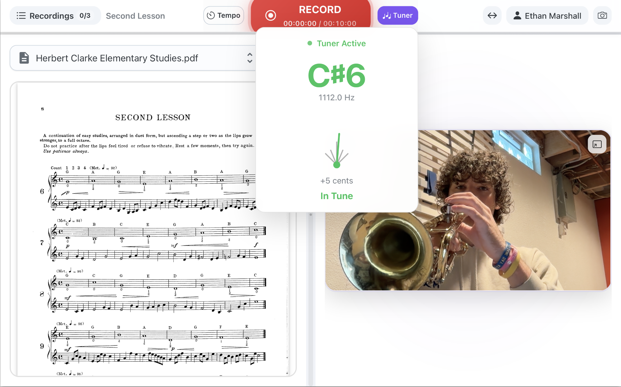 A student recording a performance in the Chorale Studio, with the record button and live waveform.